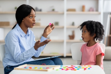 speech therapist in ABA therapy clinic